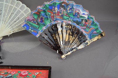 Lot 322 - A Chinese export black lacquer 19th Century hand-painted fan