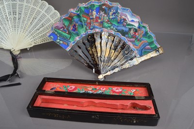 Lot 322 - A Chinese export black lacquer 19th Century hand-painted fan