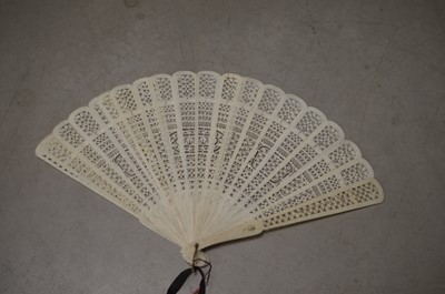 Lot 322 - A Chinese export black lacquer 19th Century hand-painted fan