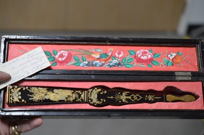 Lot 322 - A Chinese export black lacquer 19th Century hand-painted fan