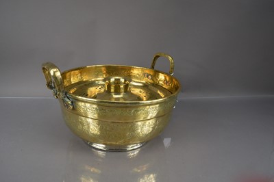 Lot 328 - A Middle Eastern polished brass basin and  cover