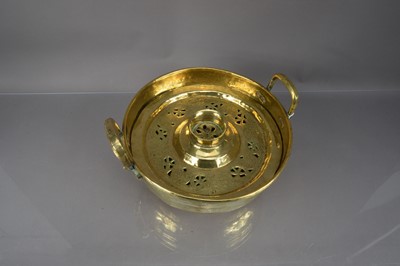 Lot 328 - A Middle Eastern polished brass basin and  cover