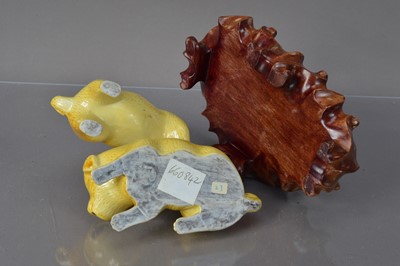 Lot 336 - A Chinese yellow glazed porcelain sculpture group of dogs playing