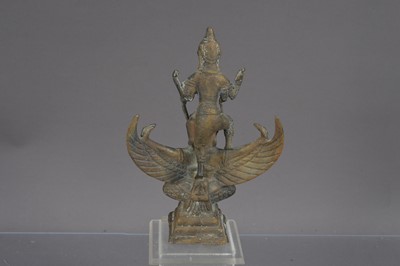 Lot 339 - A small bronze Hindu statue of the god Vishnu riding on Garuda