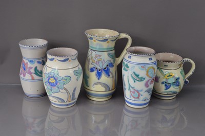 Lot 342 - Five vintage Honiton and other terracotta and floral decorated jugs and vases