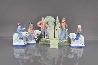 Lot 381 - Five modern Rye Pottery figurines and a Sowerby style glass vase