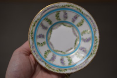 Lot 382 - A set of four French 18th Century style porcelain cups and saucers