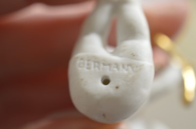 Lot 388 - A collection of German miniature bisque porcelain cherubs