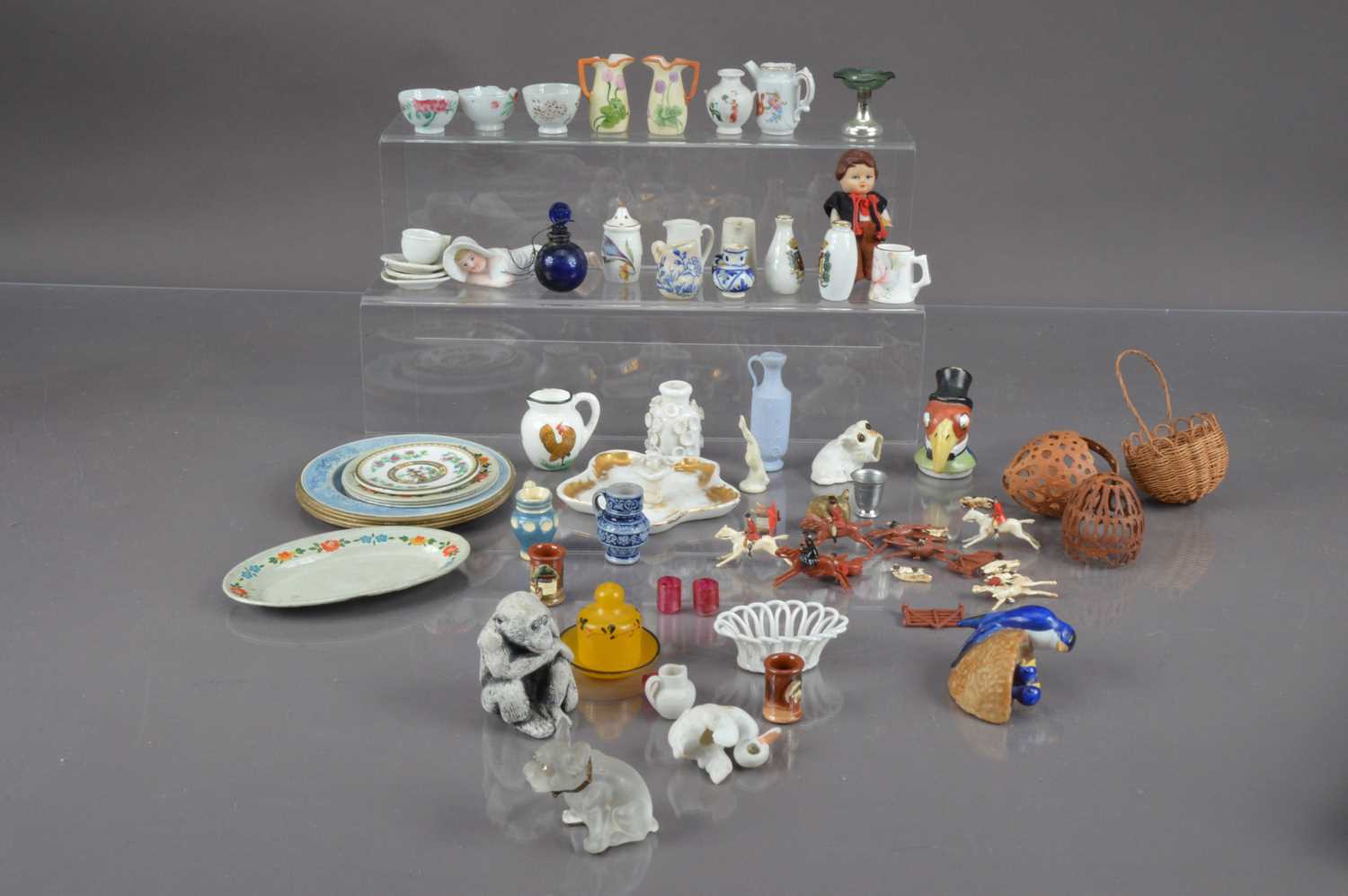 Lot 391 - A frosted glass French bulldog with rhinestone eyes