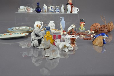 Lot 391 - A frosted glass French bulldog with rhinestone eyes