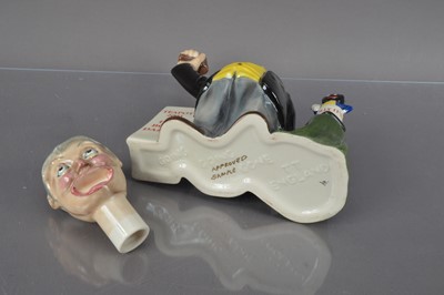 Lot 401 - A novelty "Going Going Gone" pottery teapot designed by Vince McDonald for 'Totally Teapots' of Stoke-On-Trent