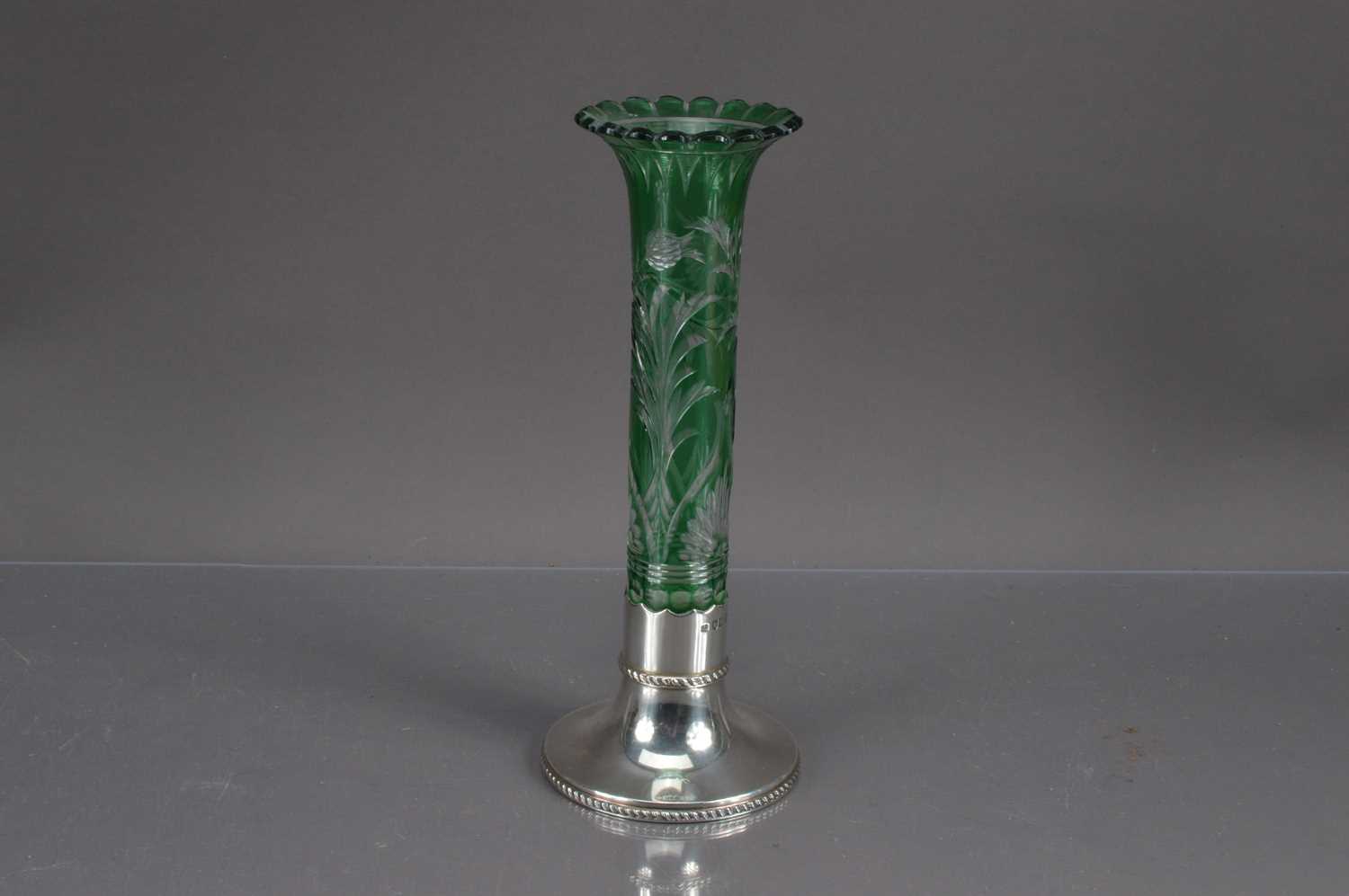 Lot 409 - A Victorian silver mounted green glass cut to clear vase