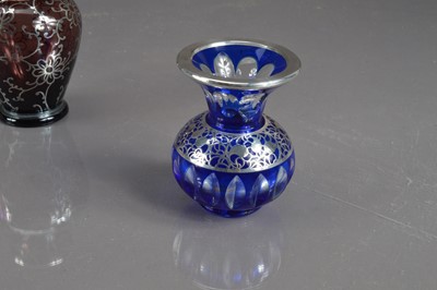 Lot 414 - Three Bohemian silver overlay glass items