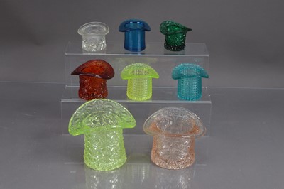 Lot 419 - Eight 20th Century pressed glass top hat shape glass trinket pots posy vases etc