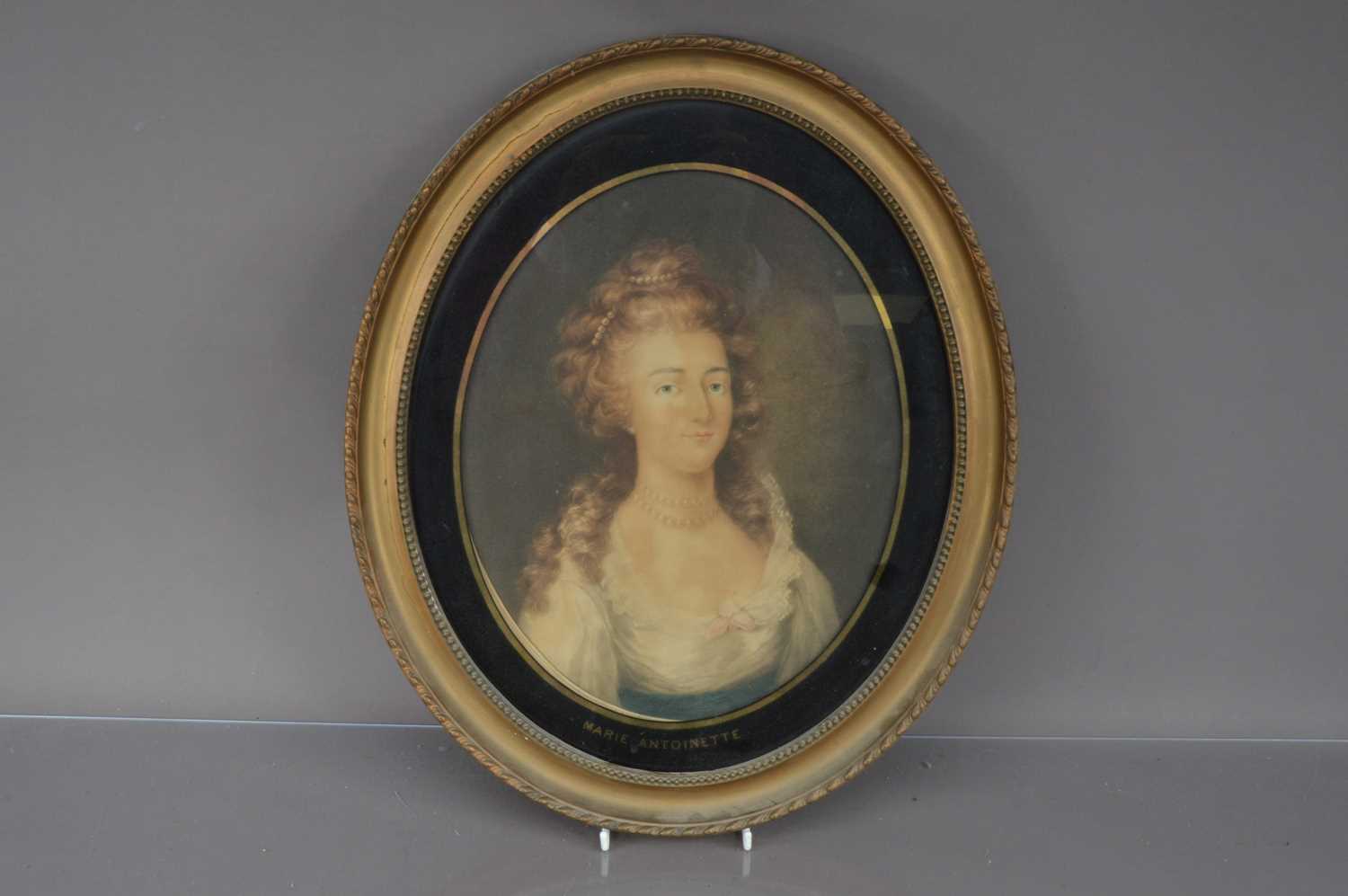 Lot 450 - A framed late 19th or early 20th century oval print
