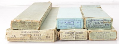 Lot 261 - Hornby Dublo 00 Gauge Pre-War Clockwork Track in original boxes (6 boxes, 29 pieces)