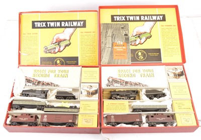 Lot 379 - A pair of Trix (TTR) 00 Gauge 3-rail 14v AC American Freight Train Packs (2)