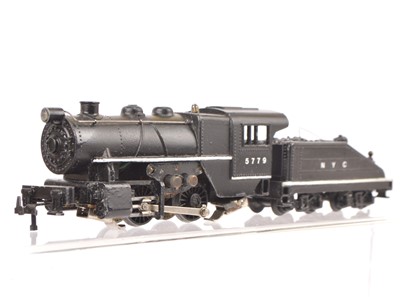 Lot 399 - An uncommon Trix 00 Gauge 12v DC kit-built American 'Switcher' Locomotive and Tender