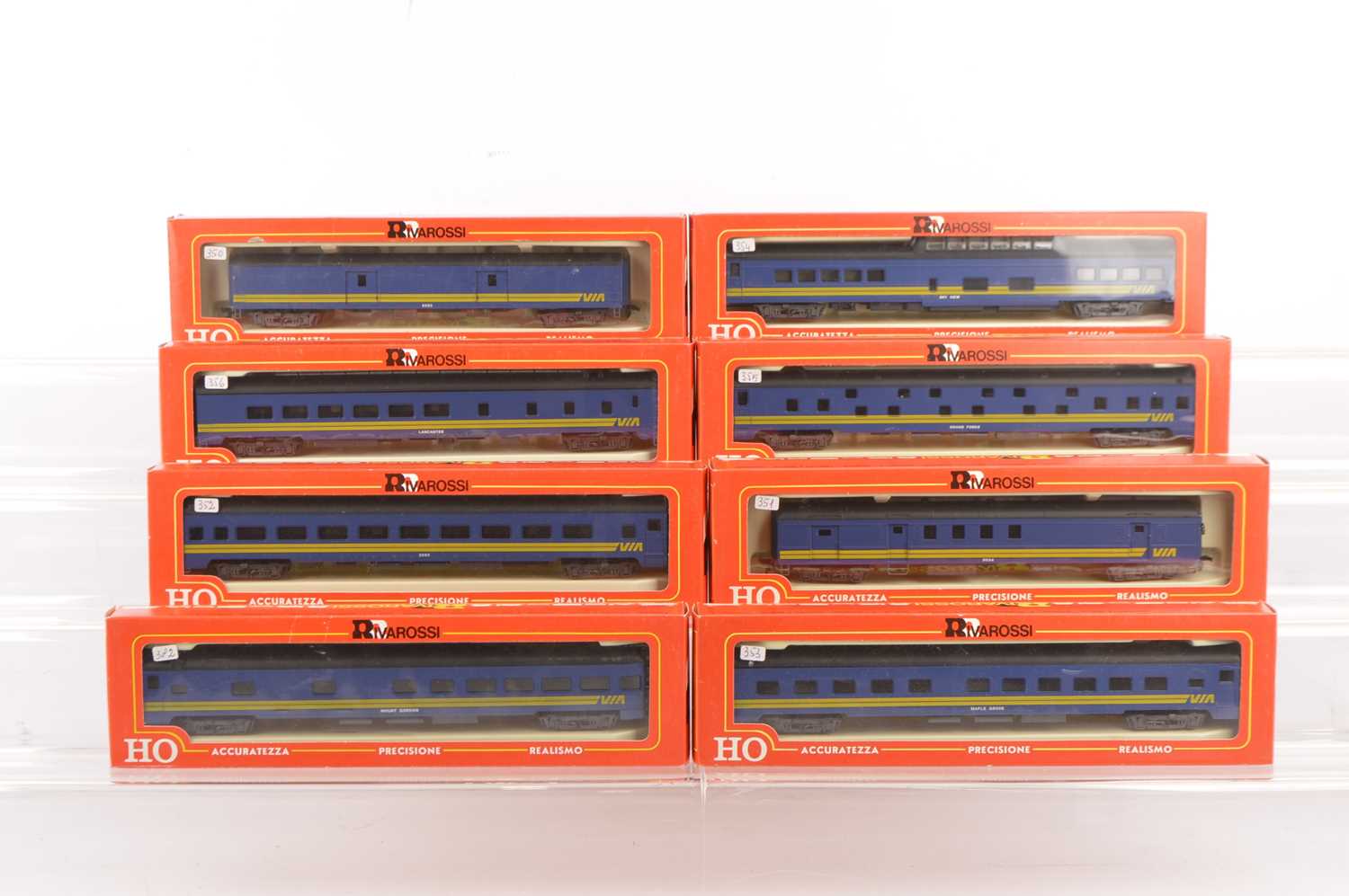 Lot 651 - Rivarossi H0 Gauge Archive collection VIA blue Coaches with yellow stripes (8)