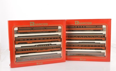 Lot 673 - Pair of Rivarossi H0 Gauge Archive collection The Milwaukee Road orange and brown Coaches with blue stripes Box Sets (2 sets, 8 coaches)