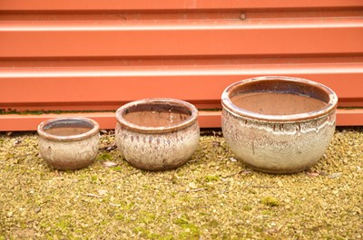 Lot 341 - Three graduated glazed plant pots