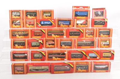 Lot 122 - Hornby  00 gauge assorted freight wagons in original boxes (34)