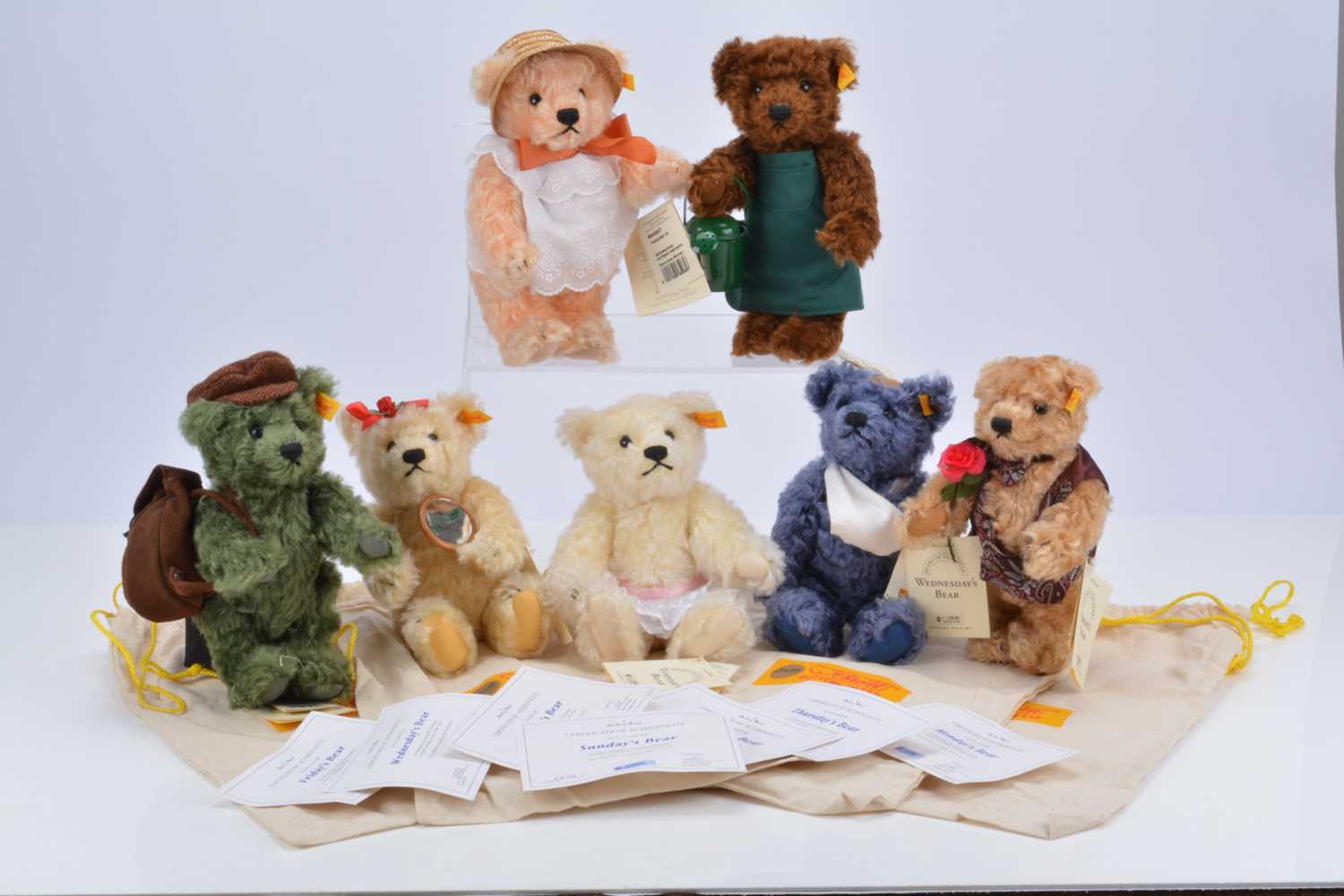 Lot 9 - A complete collection of Steiff yellow tag Bears of the Week teddy bears