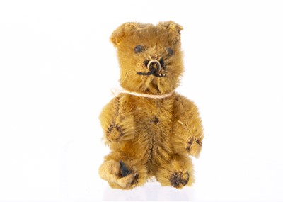 Lot 36 - A miniature Schuco teddy bear 1920s