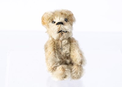 Lot 39 - A post war miniature Schuco teddy bear
