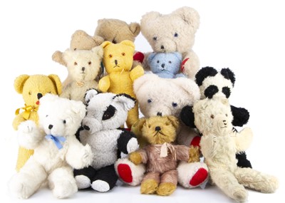 Lot 53 - Thirteen vintage unjointed teddy bears