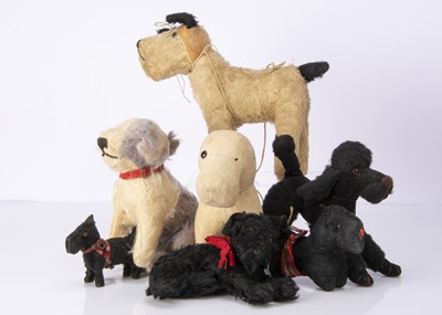 Lot 60 - Seven soft toy dogs 1920's and later