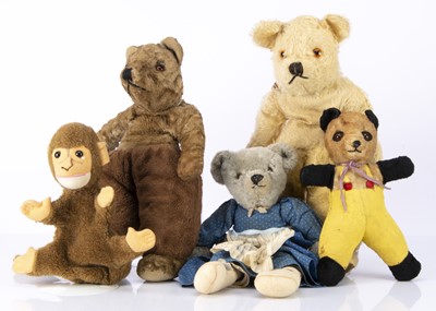 Lot 140 - Four unjointed dressed teddy bears