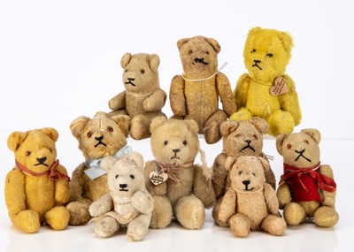 Lot 147 - Ten small German post-war pin-jointed teddy bears