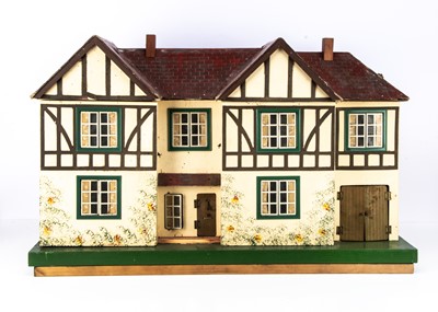 Lot 253 - A 1940s Tri-ang dolls' house No.77