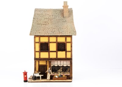 Lot 259 - A Jim Hemsley Tigger Pond 1/24th scale  modern miniaturist wall mounted dolls’ house cake shop