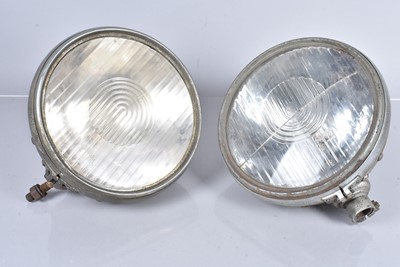 Lot 554 - A pair of Bosch headlamps