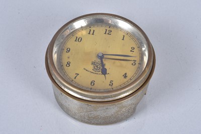 Lot 561 - A Smith's brass faced dashboard clock