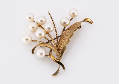 Lot 10 - A 14k marked yellow metal and cultred pearl spray brooch