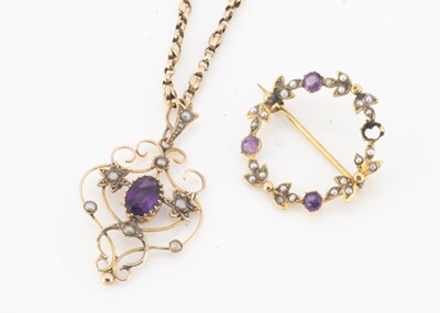 Lot 26 - Two Edwardian 9ct gold amethyst and seed pearl jewels