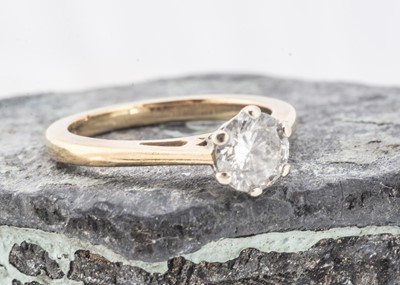Lot 52 - A certificated IGI diamond solitaire 18ct gold ring