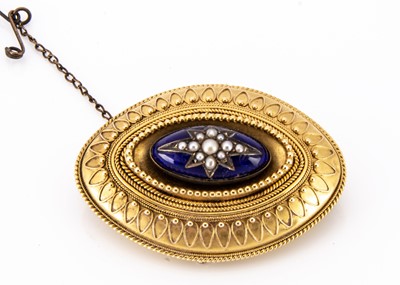 Lot 80 - A Victorian yellow metal oval enamel and seed pearl brooch