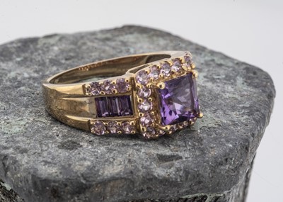 Lot 115 - A contemporary QVC 9ct gold amethyst cluster dress ring