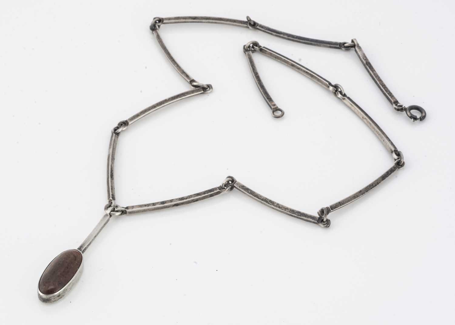 Lot 163 - A Danish silver and amber pendant and chain