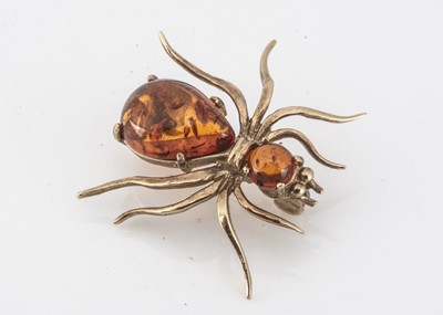 Lot 164 - A 9ct gold amber spider brooch