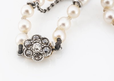 Lot 172 - A string of knotted, graduated pearls