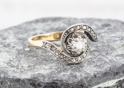Lot 183 - A French belle epoque diamond crossover dress ring