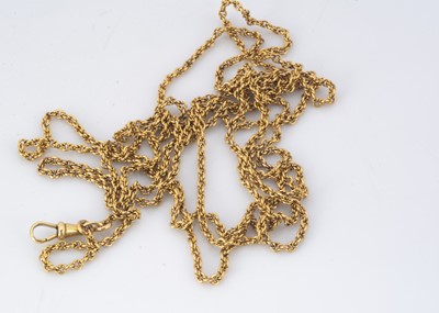 Lot 194 - An opera length 18ct gold French marked guard chain
