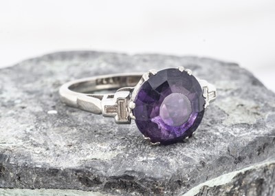 Lot 199 - A platinum and 18ct gold amethyst and diamond dress ring