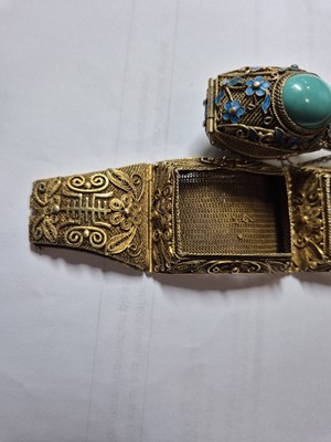 Lot 226 - A Chinese silver gilt and turquoise bracelet