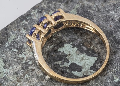 Lot 237 - A 9ct gold tanzanite and white diamond dress ring